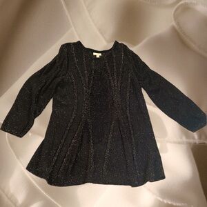 Sparkly black sweater that will dress up jeans or leggings!